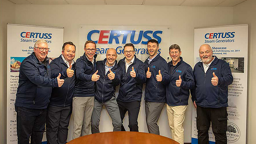 [Translate to Deutsch:] Group photo of CERTUSS employees