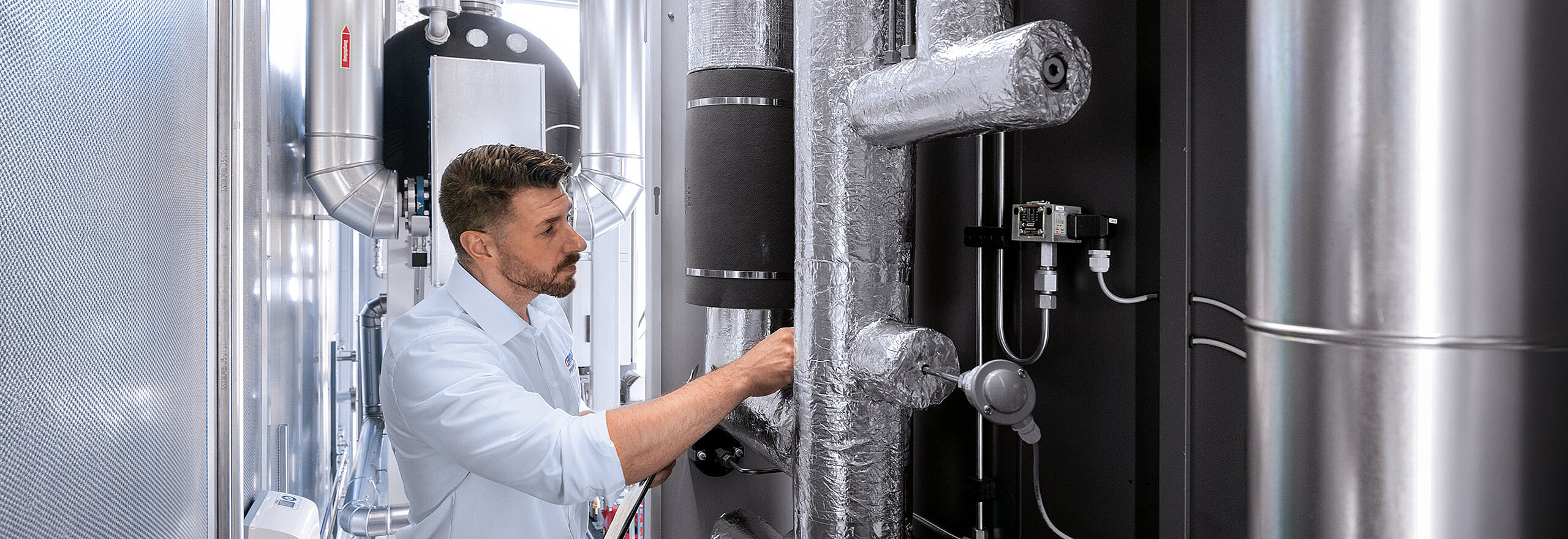 CERTUSS employees testing a steam system