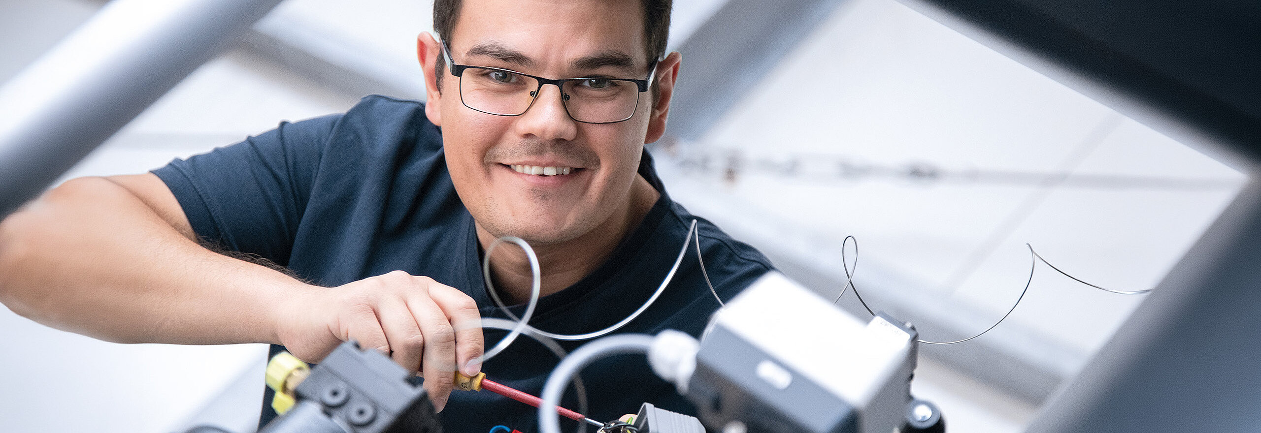 CERTUSS employees working on the steam generator cabling